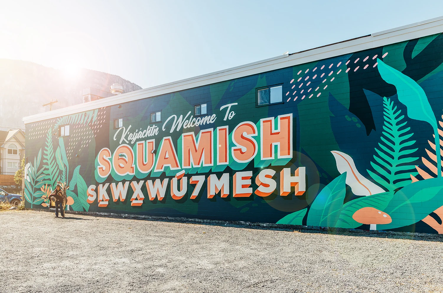 https://www.downtownsquamish.com/wp-content/uploads/2024/06/Squamish-Public-Art-Welcome-to-Squamish-Mural-Alex-Fowkes3.jpg-1.webp