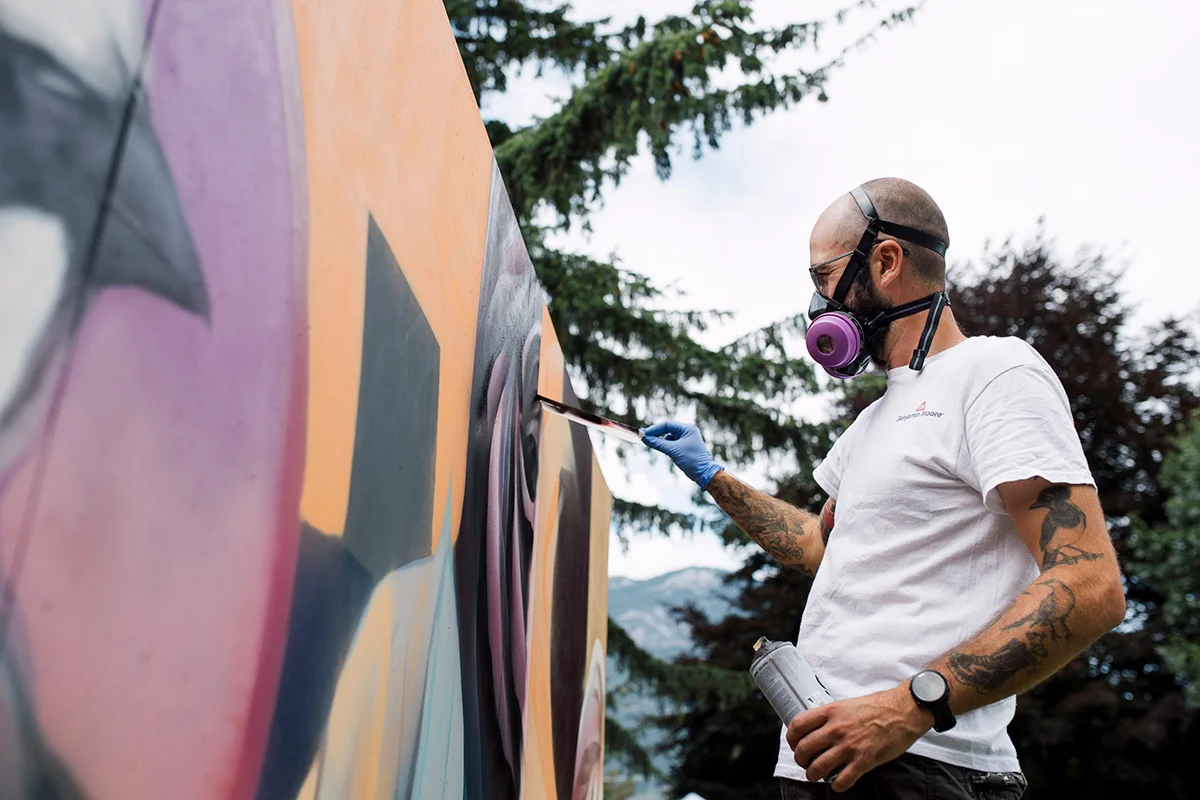 https://www.downtownsquamish.com/wp-content/uploads/2024/07/Squamish-Public-Art-2023-Squamish-Mural-Walk-Downtown-Squamish-BIA-Up-And-Over-Dom-Laporte.webp