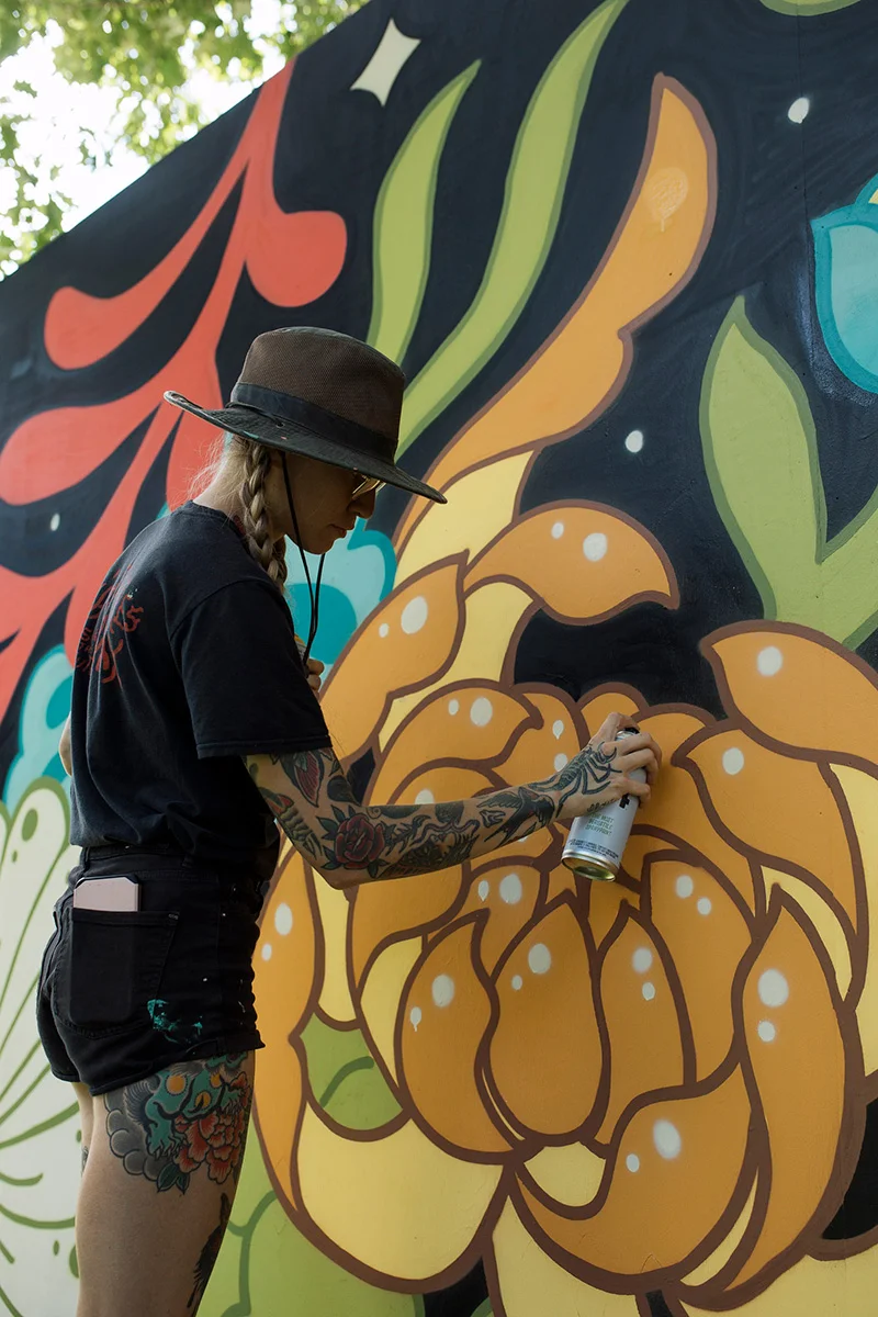 https://www.downtownsquamish.com/wp-content/uploads/2024/07/Squamish-Public-Art-Flowers-Mural-Jillian-Mundy3.webp