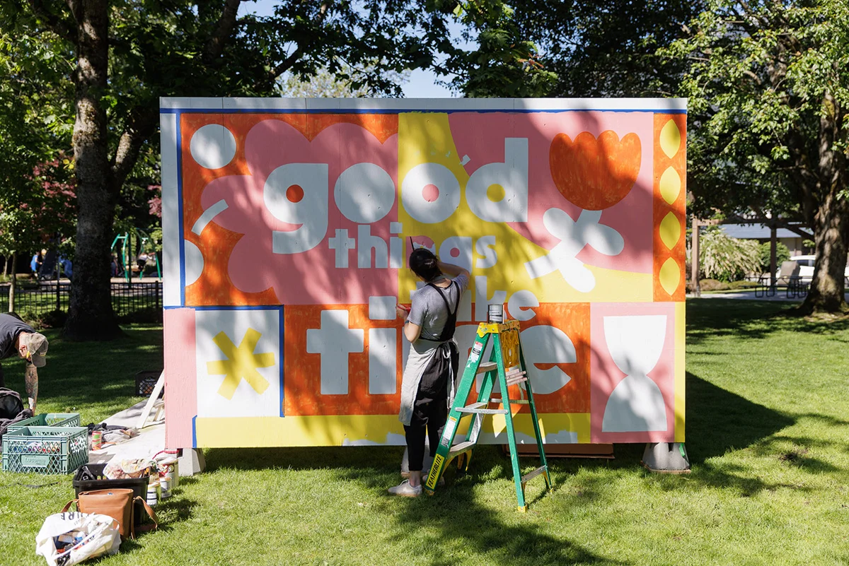 https://www.downtownsquamish.com/wp-content/uploads/2024/07/Squamish-Public-Art-Squamish-Mural-Festival-Squamish-Downtown-BIA-Good-Things-Take-Time-DT2.webp